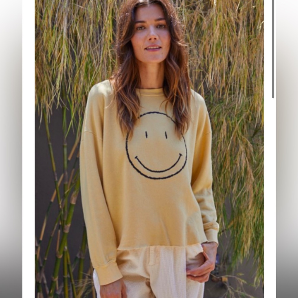 Smiley face sweater